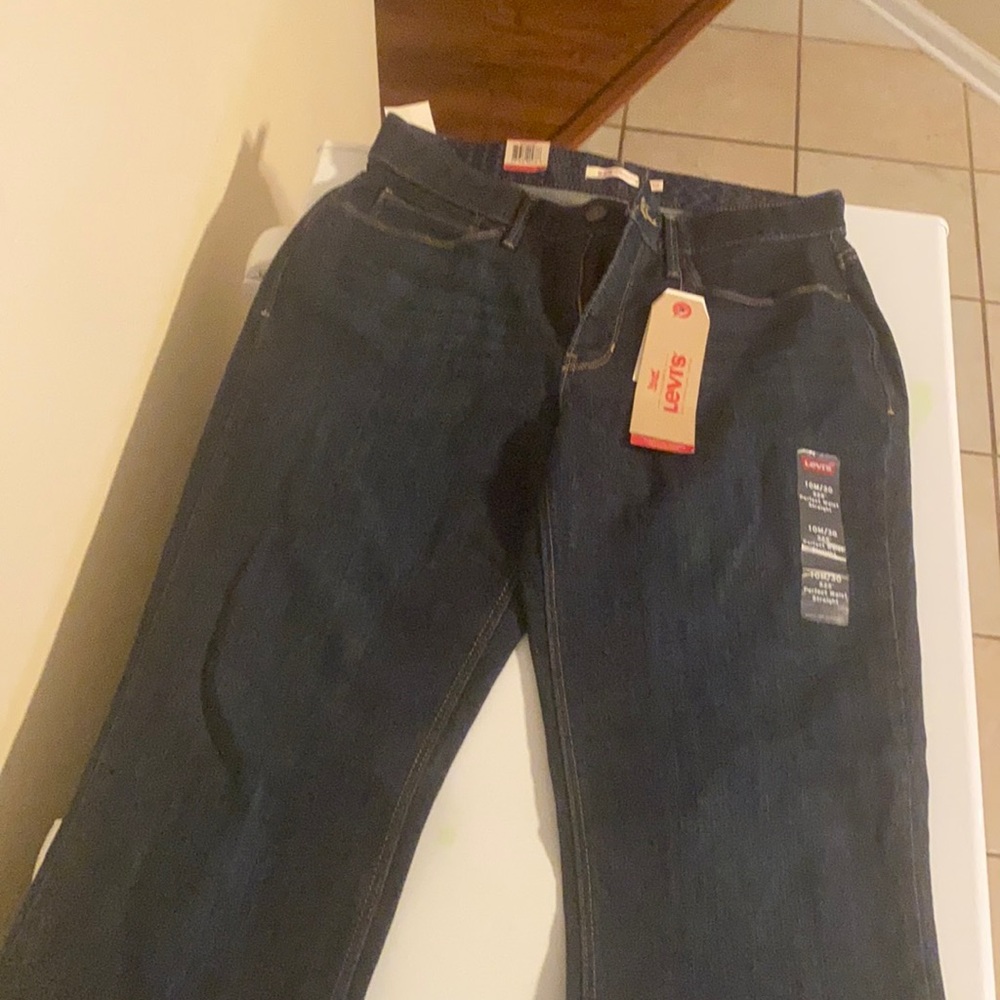 Never worn dark blue jeans sz 10